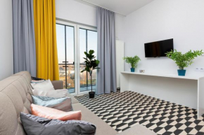Central Business District Warsaw Apartments by Noclegi Renters